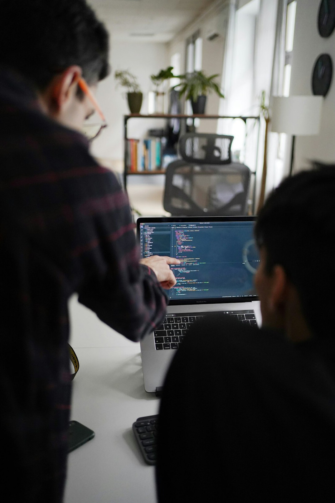 person learning to code on laptop