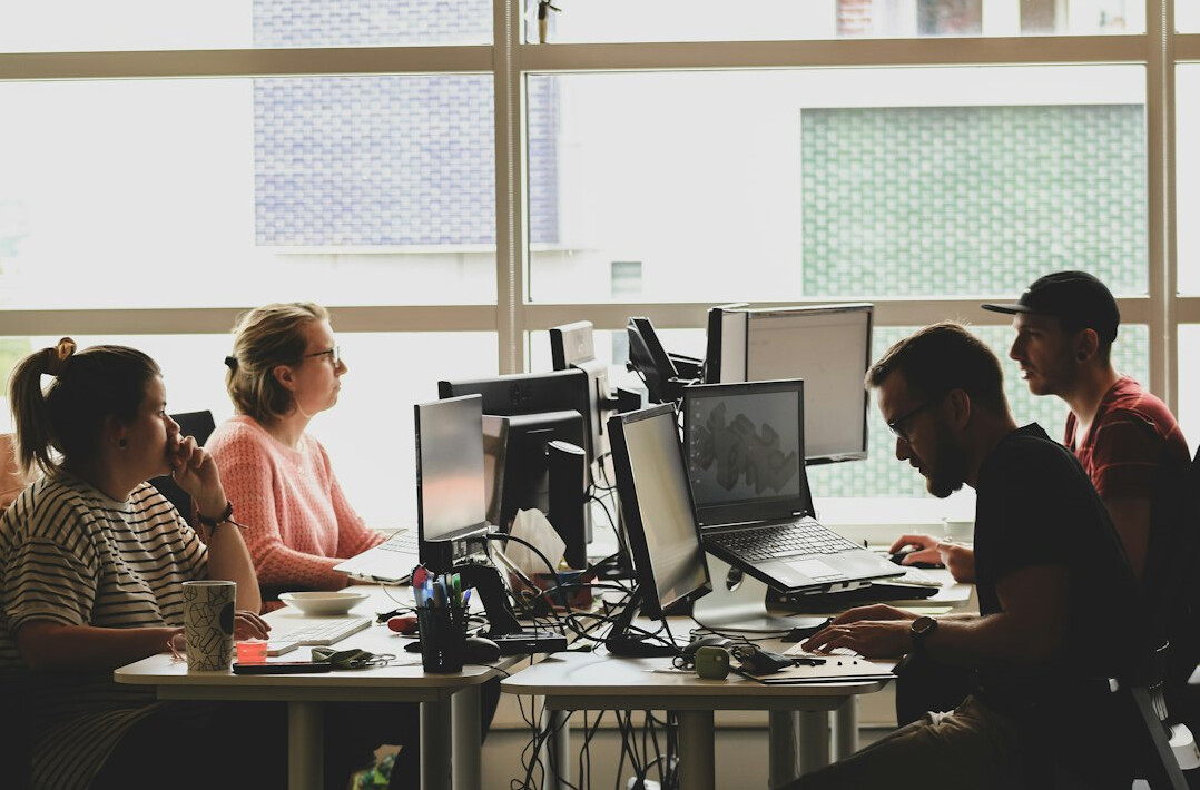 diverse team coding together