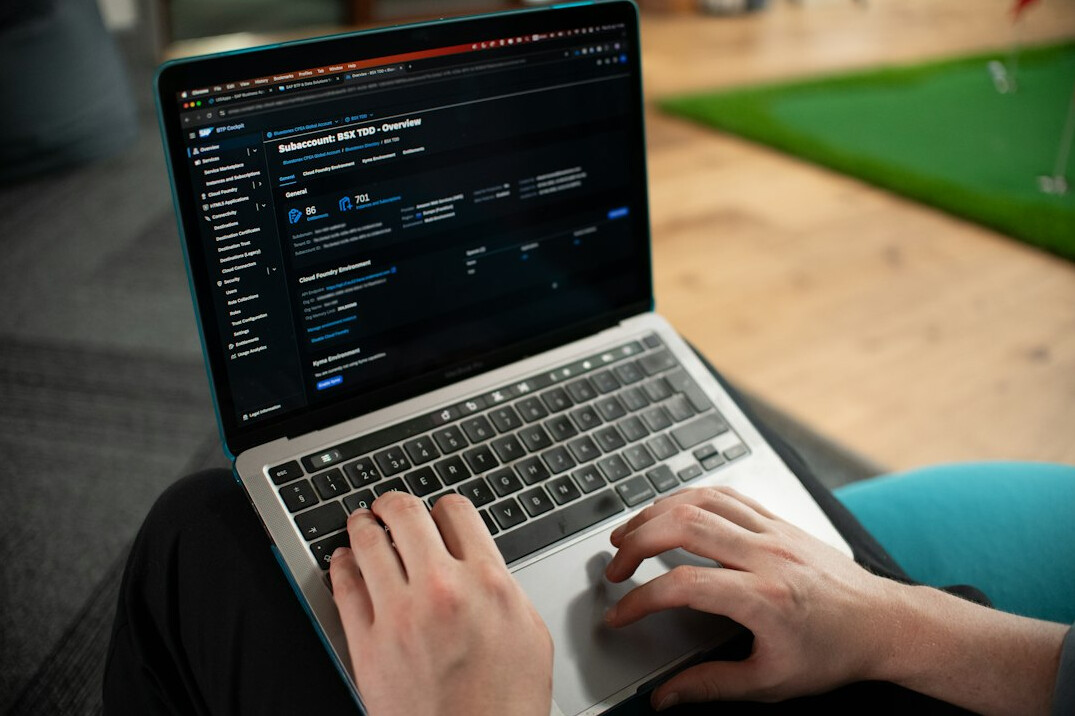 person learning to code on laptop